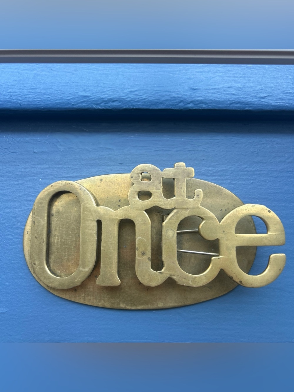 Vintage brass at once office paper clip and weight